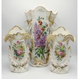 A three piece Continental porcelain vase garniture, late 19th century, with hand painted floral