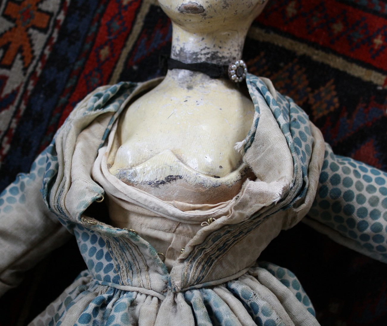 An early 19th century carved wooden doll, probably Continental, the well carved head with painted - Image 5 of 16
