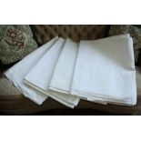 A quantity of table linen, including table cloths, napkins etc.,