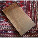 A mahogany shove ha’penny board