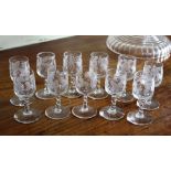 A set of eleven etched liqueur glasses, early 20th century, the plain funnel bowls with etched