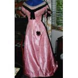 An elegant Victorian silk evening dress, two piece, in pink striped silk, the top with lace and