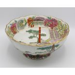 A Masons stoneware famille rose style punch bowl, early 20th century, undulating gilt rim, interior