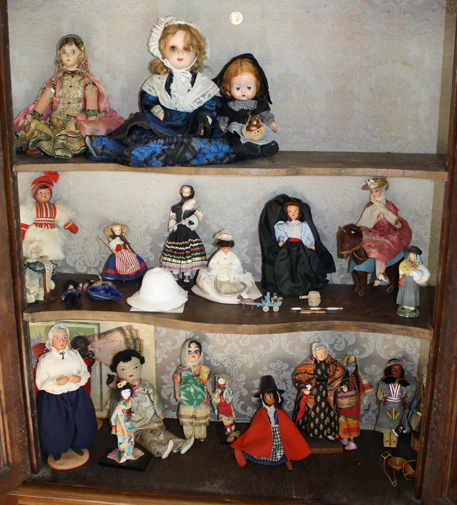 A collection of costume and souvenir dolls, 1920s-60s, in a wide variety of various national