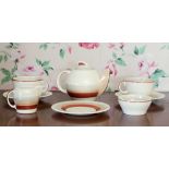 A Susie Cooper 'Kestrel' pattern part tea set, 1930s, comprising teapot, two cups, three saucers,