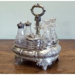 A Victorian silver cruet stand, George Frederick Pinnell, London 1842, of rectangular bombe form,