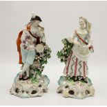 A pair of Derby porcelain figures of musicians, late 18th century, comprising a cloaked dandy