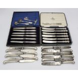 A cased set of six George V silver handled fruit knives, James Deakin & Sons, Sheffield 1916,