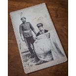 A rare portrait photograph of the King and Queen of Nepal, c.1910, black and white, mounted on