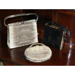 Three vintage snake skin handbags, 1930s-40s, two in python skin, one of flared rectangular form