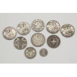 A small collection of silver coins, including two Victorian crowns (1892 milled edge, 1896 Latin