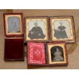 A cased mid-19th century daguerreotype, depicting a seated gentleman in tailcoat, a stovepipe hat