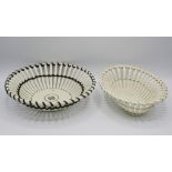 Two early 19th century creamware chestnut baskets, English, one circular with brown painted