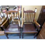 A pair of walnut armchairs, with brown studded leather upholstery. Provenance: Oddfellows Loyal