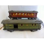 Two Marklin O gauge tinplate coaches, comprising a Mitropa Schlafwagen corridor coach and a 18440