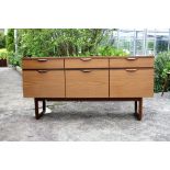 A vintage/retro Ercol style light elm sideboard.