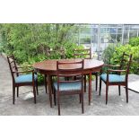 A 1960's Greaves & Thomas rosewood efect dining room suite consisting of table & six chairs (7).