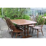 A Ercol dark elm refrectory table & six Quaker style chairs (7).