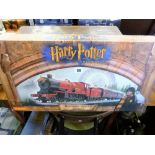A boxed Hornby Harry Potter and the Philosophers Stone Hogwarts Express train set.