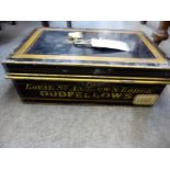 A vintage black & gold tin document box relating to Oddfellows Loyal Guernsey Lodge, sign written to