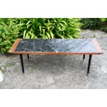 A 4ft 3in long 1950/70's coffee table.