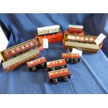 A collection of ten Hornby O gauge coaches, comprising two boxed No.2 Corridor Coaches Ref No: