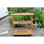 A vintage Ercol Windsor three tier hostess tea trolley.