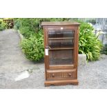 A Ercol dark elm Hi-Fi/media cabinet.