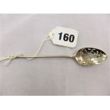 A finely detailed antique silver mote spoon.