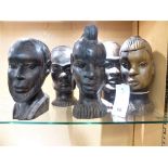 Five African hand carved ebony tribal busts.