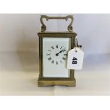 A vintage brass carriage clock.
