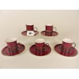 Five Shelley coffee cans & saucers with silver holdersin maroon and gold gilt, Birmingham c1923 by