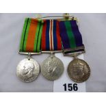 A set of three WWII War medals with ribbons, Defence medal, War medal & General Service Palestine