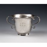 An 18th century Channel Islands silver christening cup, maker's mark ID overstruck over London