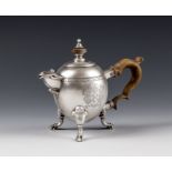 An exceptional and important George II Channel Islands silver covered hot milk jug, maker's mark