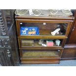 A three section Globe Wernike display bookcase.