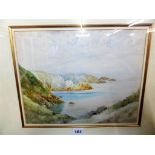 A framed W. J. Caparne watercolour Guernsey south coast cliff and coastal scene.