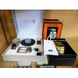 A boxed Swiss Connection Gents watch, belt, cuff links & keyring set plus two Prince London Gents