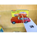 A Corgi 327 MGB GT red sports car. With original box.