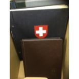 SWITZERLAND STAMPS : Collections in two printed albums & U/M & fine used sets in a small stockbook.