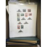 STAMPS : Mixed box of album pages and albums including Rhodesia and thematic issues.