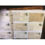 POSTCARDS : Large album of postcards, displayed for their postmarks, includes Skeletons,