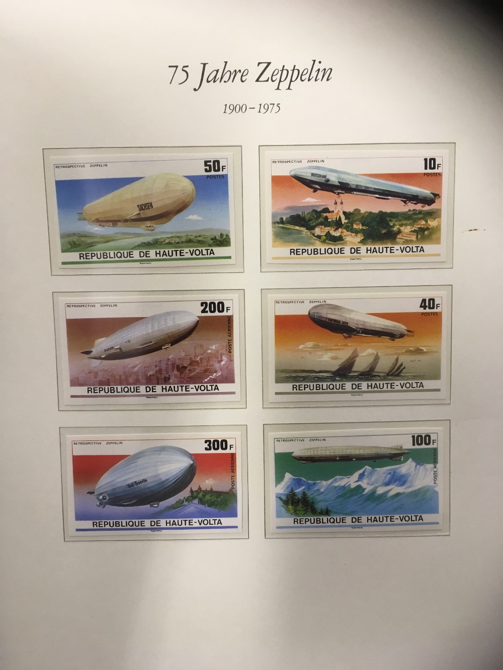 STAMPS : 75th Anniversary of Graf Zeppelin in four special albums, pages written up in German text.