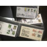 GREAT BRITAIN STAMPS : Three small cover albums with better First Day Covers including a good run