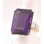 Amethyst Dress Ring Set on 18 Carat Yellow Gold Band with Baguette Cut Diamond Decoration to