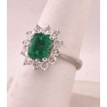Emerald and Diamond Cluster Set Ring Surrounded by 12 Diamonds Mounted on 18 Carat Gold, the