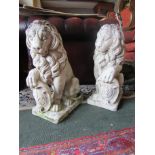 Pair of Stone Seated Lions with Shield Motifs of Good Size 22 Inches High