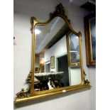 Gilded Over Mantle Mirror of Ascending Form with Carved Upper Decoration 46 Inches Wide