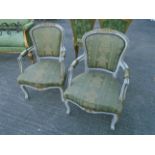 Pair of Antique French Armchairs with Silk Upholstery above Cabriole Supports