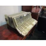 Antique Accordion with Ornate Pierced Frieze Decoration